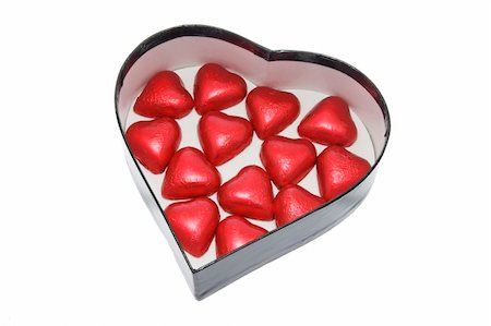 simsearch:400-04996602,k - Chocolates on Heart-shaped Gift Box on White Background Photographie de stock - Aubaine LD & Abonnement, Code: 400-04996101