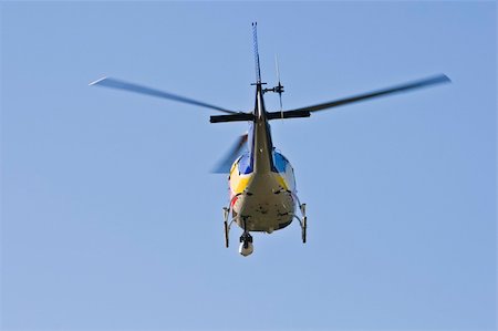 A helicopter with a camera. A motion blur on rotor blades Stock Photo - Budget Royalty-Free & Subscription, Code: 400-04996296