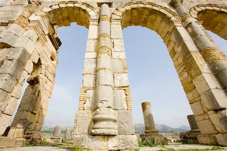 simsearch:400-05892140,k - Volubilis is the best preserved Roman site in Morocco, and features some brilliant mosaics. It was declared a UNESCO World Heritage site in 1997. Photographie de stock - Aubaine LD & Abonnement, Code: 400-04996510
