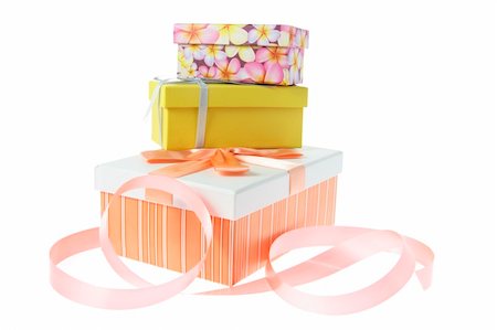 simsearch:400-04996602,k - Gift Boxes with Ribbon on White Background Photographie de stock - Aubaine LD & Abonnement, Code: 400-04996609