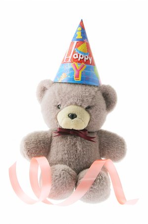 simsearch:400-04996602,k - Tedy Bear with Party Hat on White Background Photographie de stock - Aubaine LD & Abonnement, Code: 400-04996634