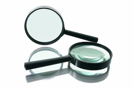 simsearch:400-04996978,k - Magnifying Glasses with Reflection on White Background Photographie de stock - Aubaine LD & Abonnement, Code: 400-04996982
