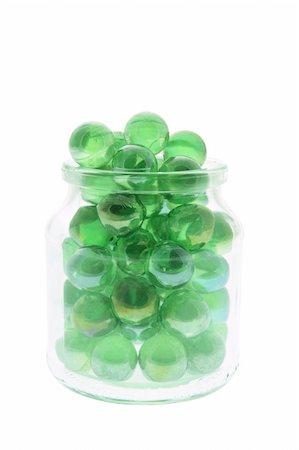 simsearch:400-04997063,k - Marbles in Glass Jar on White Background Photographie de stock - Aubaine LD & Abonnement, Code: 400-04997018