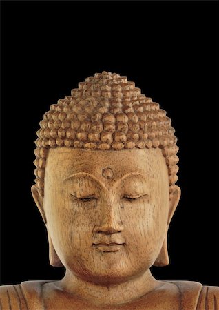 simsearch:400-05099216,k - Wooden Buddha with eyes closed in prayer, over black background. Stock Photo - Budget Royalty-Free & Subscription, Code: 400-04997251