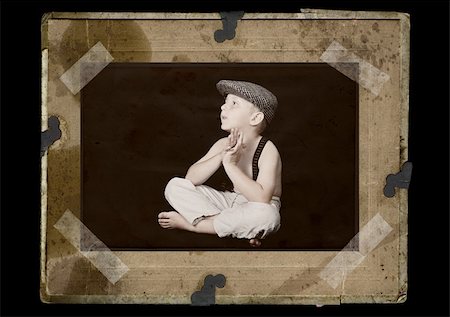 family portraits in frames - portrait of little boy - old stylized Photographie de stock - Aubaine LD & Abonnement, Code: 400-04997673