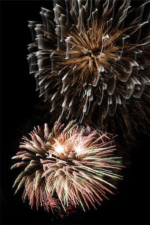 simsearch:400-06416200,k - Fireworks. Celebratory salute. Bright fires on a black background Stock Photo - Budget Royalty-Free & Subscription, Code: 400-04997832