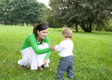 simsearch:400-04795754,k - happy family on green meadow Stock Photo - Budget Royalty-Free & Subscription, Code: 400-04997888
