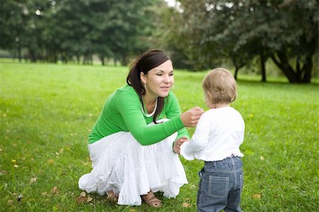 simsearch:400-04795754,k - happy family on green meadow Stock Photo - Budget Royalty-Free & Subscription, Code: 400-04997880