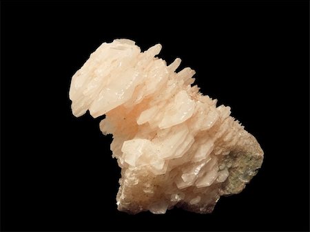 Crystals of caltsit isolated on a black background Foto de stock - Super Valor sin royalties y Suscripción, Código: 400-04998136