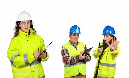 Three construction workers over a white background. Focus at front Stock Photo - Budget Royalty-Free & Subscription, Code: 400-04998599