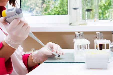 simsearch:400-04478049,k - Doctor making blood analysis in the laboratory. Shoot was made in the real laboratory Stock Photo - Budget Royalty-Free & Subscription, Code: 400-04999383