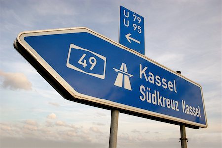 Autobahn direction sign to Kassel in Germany Foto de stock - Super Valor sin royalties y Suscripción, Código: 400-04999513