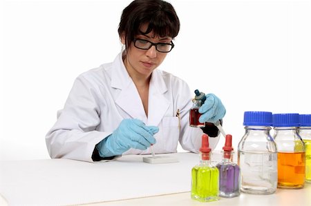 simsearch:400-04962353,k - Scientist sitting at desk during work using a spotting plate for testing.  copyspace. Stock Photo - Budget Royalty-Free & Subscription, Code: 400-04999621