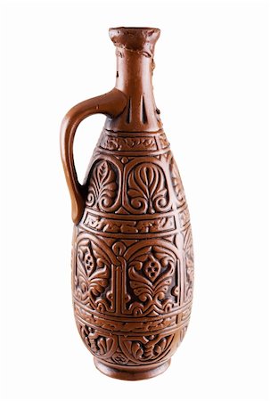 Dark brown clay jug on a white background Foto de stock - Super Valor sin royalties y Suscripción, Código: 400-04999795
