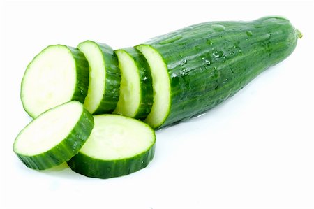 sliced cucumber - healthy eating - vegetables - close up Foto de stock - Super Valor sin royalties y Suscripción, Código: 400-04990071