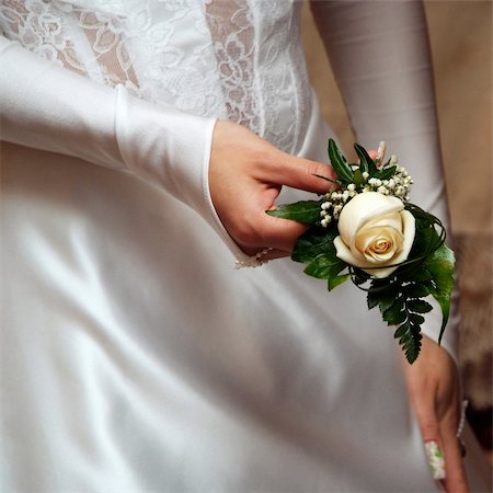 simsearch:400-04161971,k - Rose in hand of bride. Wedding gloves Stock Photo - Budget Royalty-Free & Subscription, Code: 400-04990505