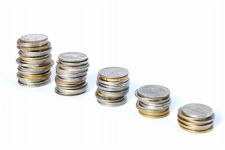 simsearch:400-04994830,k - Coin pile isolated on white background Photographie de stock - Aubaine LD & Abonnement, Code: 400-04990810