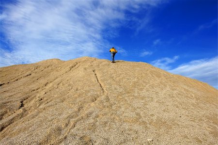 The man climbing on the top of hill Stock Photo - Budget Royalty-Free & Subscription, Code: 400-04990934