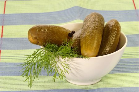 pickling gherkin - Pickled cucumbers with dill in a white bowl Stock Photo - Budget Royalty-Free & Subscription, Code: 400-04991114