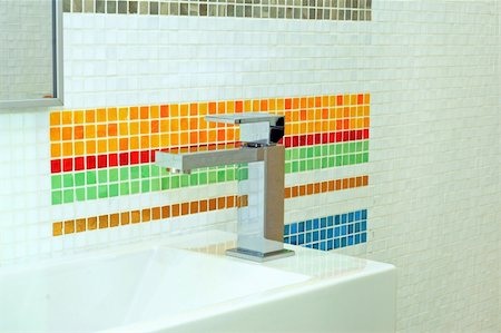 simsearch:400-05163117,k - Basin and faucet in bathroom with colourful tiles Photographie de stock - Aubaine LD & Abonnement, Code: 400-04991252