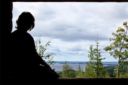 Female silhouette at a viewpoint in Finland Stock Photo - Budget Royalty-Free & Subscription, Code: 400-04991633