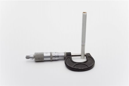 cigarette being measured with a micrometer Stockbilder - Microstock & Abonnement, Bildnummer: 400-04991787