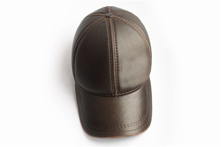 sun visor hat - cap of the brown colour, is made with skins Stock Photo - Budget Royalty-Free & Subscription, Code: 400-04992092