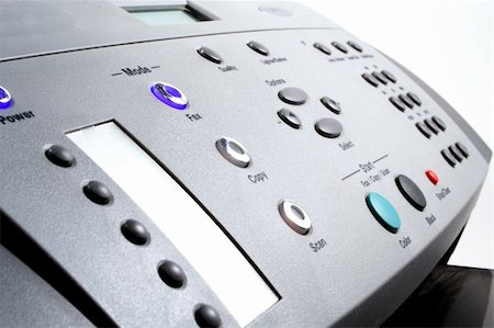 fax - A fax machine used for sending documents. Fotografie stock - Microstock e Abbonamento, Codice: 400-04992610