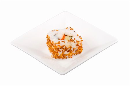 a square white plate with a piece of sushi Foto de stock - Royalty-Free Super Valor e Assinatura, Número: 400-04992709