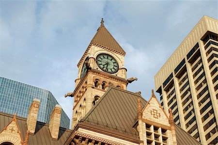 small town downtown canada - Old city hall of toronto in neo-gothic style between modern skyscrapers under the sunset light Stock Photo - Budget Royalty-Free & Subscription, Code: 400-04992796