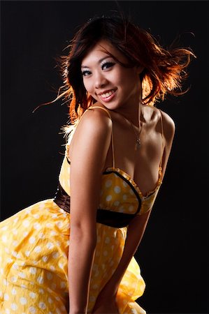 eyedear (artist) - Pretty asian girl ina sexy yelloploka dot dress Stock Photo - Budget Royalty-Free & Subscription, Code: 400-05004062