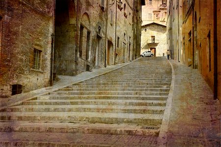 simsearch:400-04512320,k - Artistic work of my own in retro style - Postcard from Italy. - Steep alley Gubbio, Umbria, Italy Fotografie stock - Microstock e Abbonamento, Codice: 400-05004247