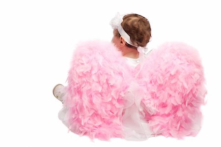 Baby angel girl with fluffy pink wings, shot from back, isolated Stock Photo - Budget Royalty-Free & Subscription, Code: 400-05004252