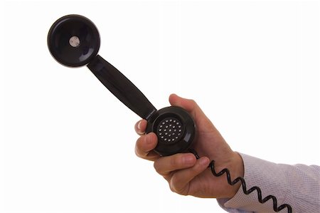 simsearch:400-06700777,k - Hand holding a vintage black telephone Foto de stock - Super Valor sin royalties y Suscripción, Código: 400-05004346