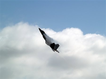 F-22 Raptor falling into stall with strong contrail Stock Photo - Budget Royalty-Free & Subscription, Code: 400-05004461