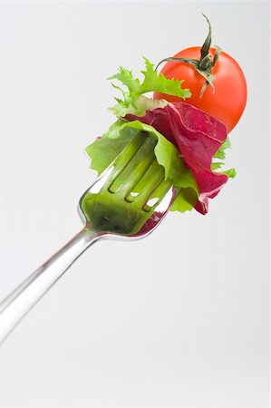 simsearch:400-04293911,k - Fork with Fresh Salad isolated over white background Stock Photo - Budget Royalty-Free & Subscription, Code: 400-05004866