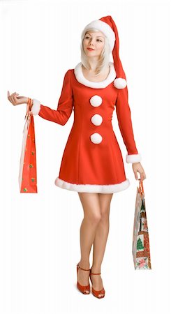 santa christmas hat women - Christmas  girl with bag. Shopping. Stock Photo - Budget Royalty-Free & Subscription, Code: 400-05005491