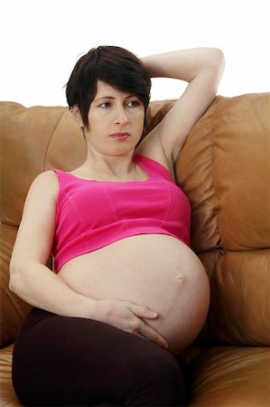 simsearch:400-08529613,k - A pregnant woman sitting on a couch Stock Photo - Budget Royalty-Free & Subscription, Code: 400-05005968