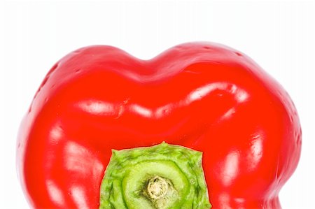 simsearch:400-05065763,k - Detail of a fresh and tasty red pepper isolated on white background. Shallow depth of field Stockbilder - Microstock & Abonnement, Bildnummer: 400-05006235