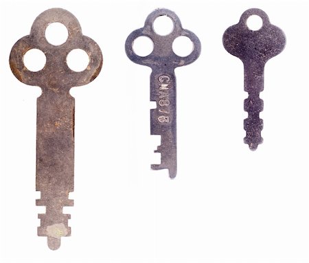Three old rusty worn keys isolated on a white background. Stockbilder - Microstock & Abonnement, Bildnummer: 400-05006344