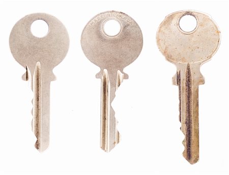 Three average office or house keys, isolated on a blank white background. Photographie de stock - Aubaine LD & Abonnement, Code: 400-05006348