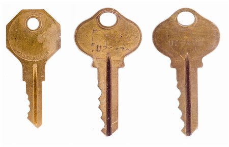 Three old office keys isolated on a white background. Photographie de stock - Aubaine LD & Abonnement, Code: 400-05006351