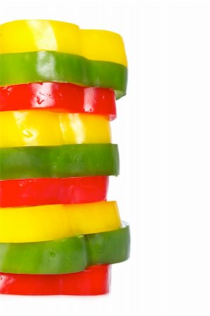 Fresh and tasty cuts of red, green and yellow paprika, isolated on white background. Shallow depth of field Foto de stock - Super Valor sin royalties y Suscripción, Código: 400-05006439