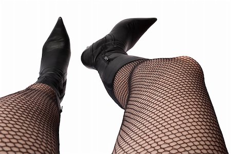 Female legs in pantyhose and boots shot from top Stock Photo - Budget Royalty-Free & Subscription, Code: 400-05006430
