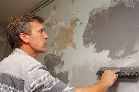 Worker at work doing indoor house repair with plaster Photographie de stock - Aubaine LD & Abonnement, Code: 400-05006489