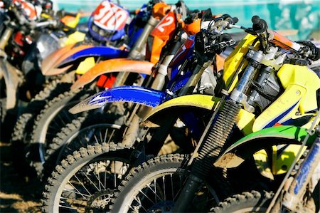 row of motobikes, close up at wheels Stock Photo - Budget Royalty-Free & Subscription, Code: 400-05006657