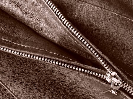 sepia toned leather jacket fragment with metal zipper Stock Photo - Budget Royalty-Free & Subscription, Code: 400-05006766