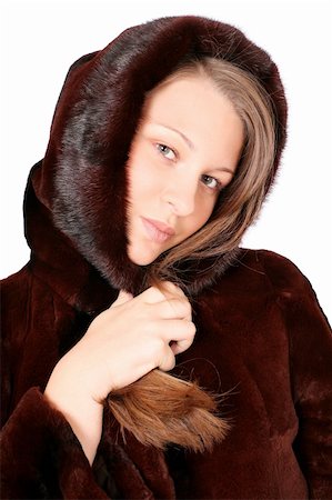 dead_morozzzka (artist) - An attractive smiling girl wearing a fur-coat standing over white background Photographie de stock - Aubaine LD & Abonnement, Code: 400-05007282