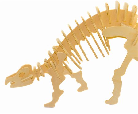 Element of wooden model of a dinosaur - children toy Fotografie stock - Microstock e Abbonamento, Codice: 400-05007544
