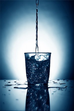 alcohol splash on the gray background close up Stock Photo - Budget Royalty-Free & Subscription, Code: 400-05007870
